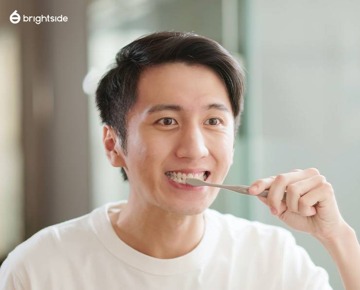  Image of person brushing teeth
